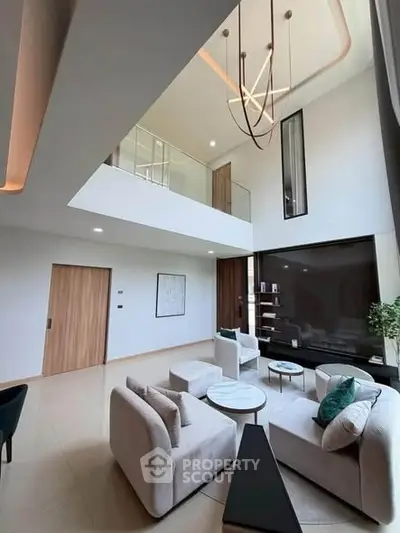 Luxurious modern living room with high ceilings and elegant decor