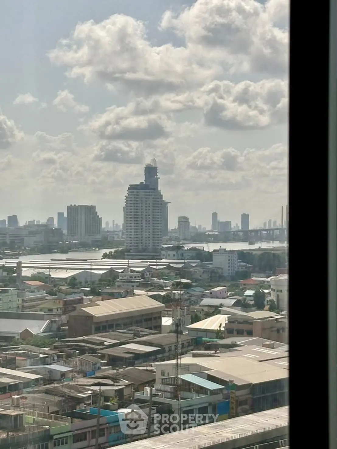 Stunning cityscape view from high-rise building window, showcasing urban skyline and expansive horizon.