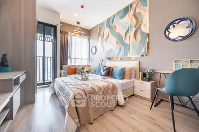 Modern bedroom with stylish decor and balcony access in a high-rise apartment.