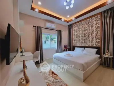 Luxurious modern bedroom with elegant decor and ambient lighting