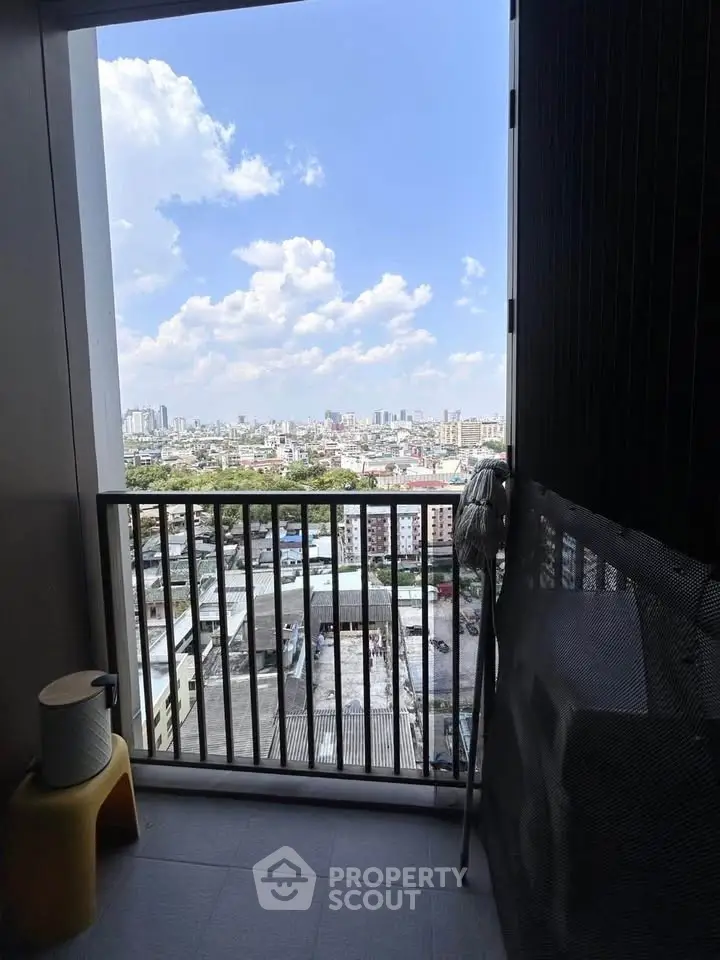 Stunning cityscape view from a high-rise balcony, perfect for urban living enthusiasts.