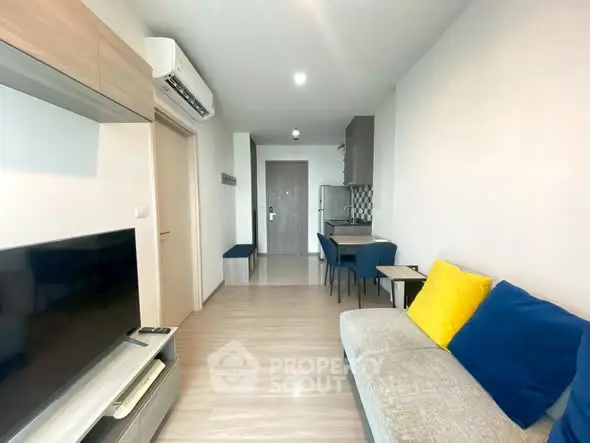 Modern living room with stylish decor and open layout in a contemporary apartment.