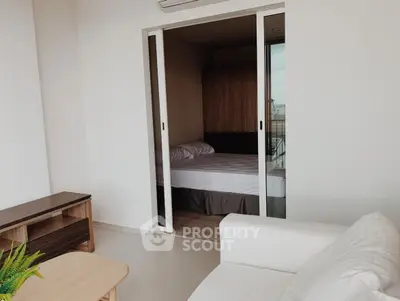 Modern apartment with cozy bedroom and stylish living area