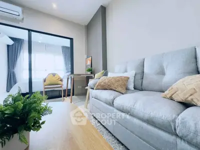 Modern living room with cozy sofa and stylish decor in a bright apartment