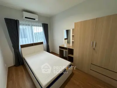 Modern bedroom with stylish furniture and natural light