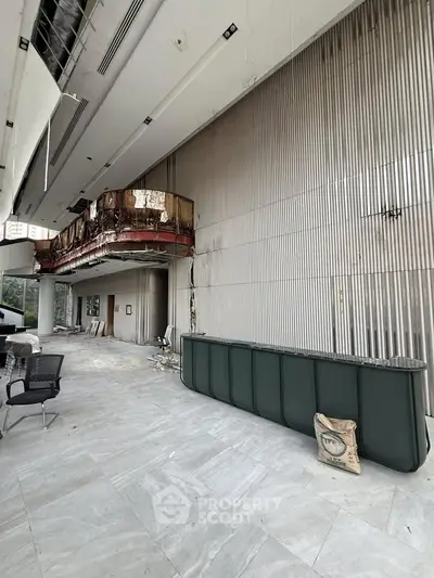 Spacious modern lobby with high ceilings and sleek design elements