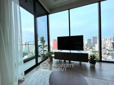 Luxurious living room with floor-to-ceiling windows offering stunning city views