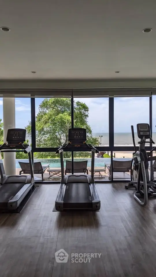Luxury gym with ocean view and modern equipment