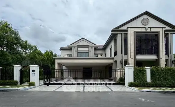 Luxurious modern mansion with grand entrance and spacious driveway