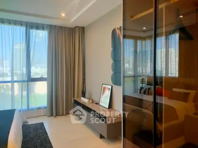 Luxurious modern bedroom with floor-to-ceiling windows and stylish decor