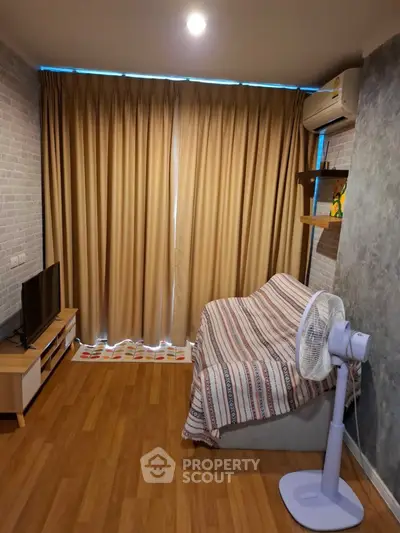 Cozy living room with modern decor and air conditioning