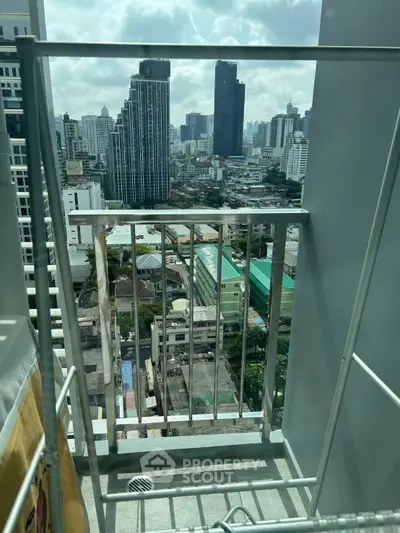Stunning cityscape view from a high-rise balcony, perfect for urban living enthusiasts.
