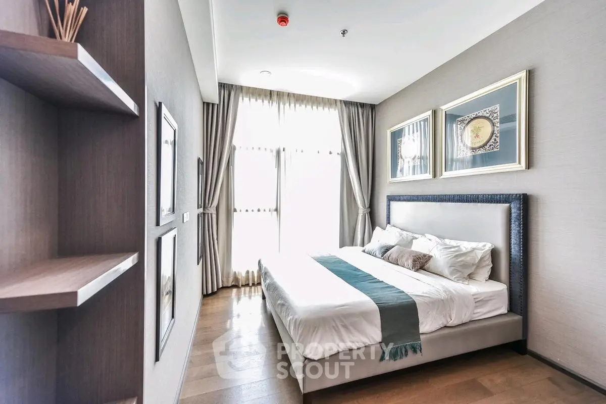 Luxurious bedroom with elegant decor and natural light