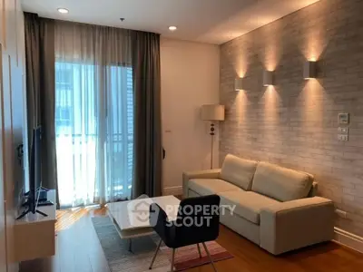 Modern living room with stylish lighting and cozy furniture