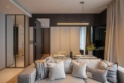 Modern living room with elegant decor and dining area in luxury apartment