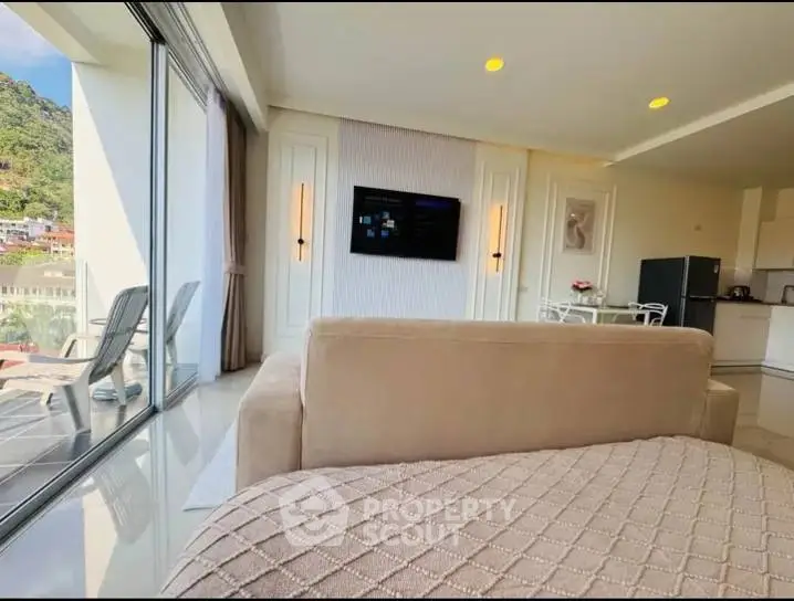 Luxurious living room with stunning view and modern decor in high-rise apartment