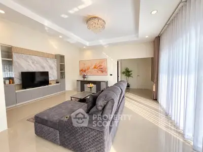 Spacious modern living room with elegant decor and natural light