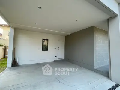 Spacious modern garage with sleek design and ample storage potential.