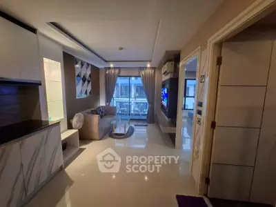 Modern living room with sleek design and balcony view in luxury apartment