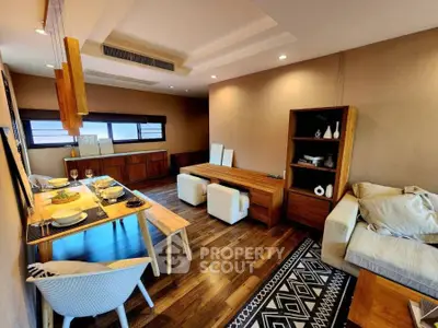 Modern living room with stylish wooden furniture and cozy seating area