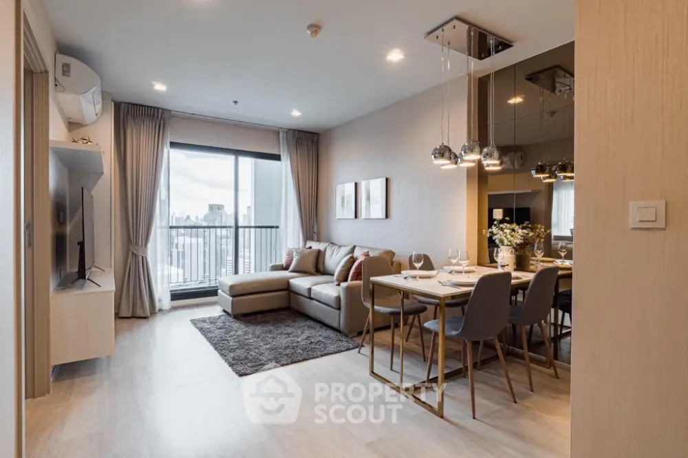 Modern living room with city view, stylish decor, and dining area in open layout apartment.