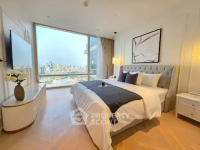 Luxurious bedroom with stunning city view and elegant decor