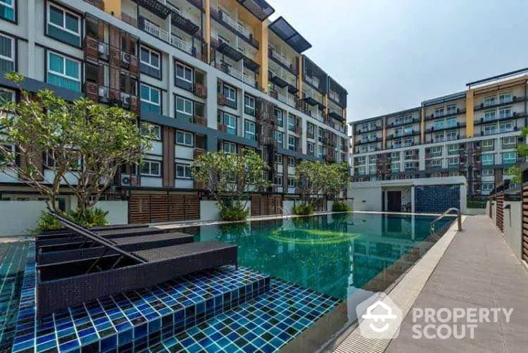 Modern condominium with luxurious swimming pool and stylish architecture