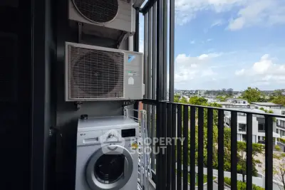 Modern apartment balcony with washing machine and scenic view
