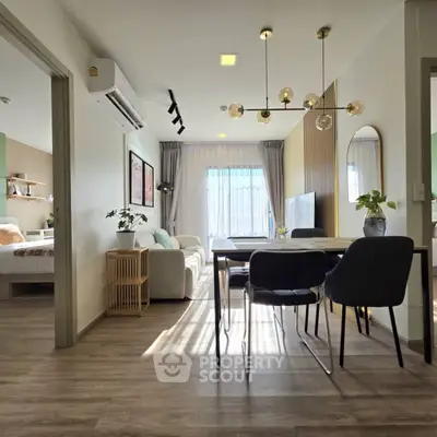 Modern living room with stylish dining area and natural light