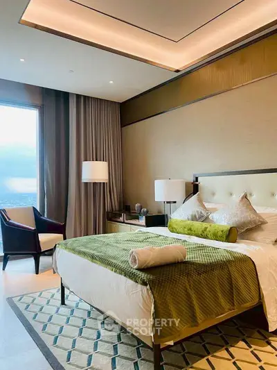 Luxurious bedroom with elegant decor and stunning city view from large window.