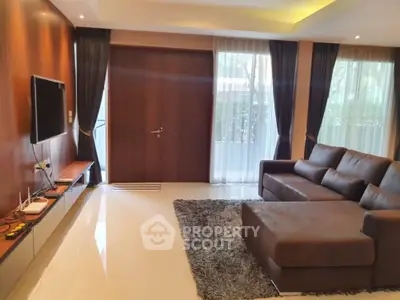 Luxurious living room with modern decor and cozy seating area