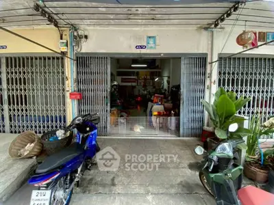 Charming street-level shopfront with motorbike parking, ideal for small business or retail space.