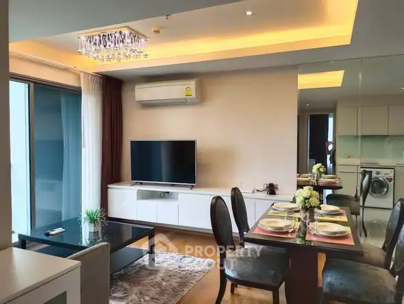 Modern living room with dining area, featuring elegant decor and natural light, perfect for urban living.