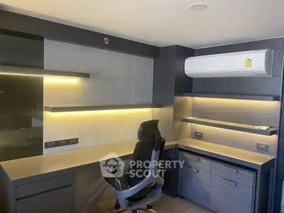 Modern study room with sleek desk, ergonomic chair, and ambient lighting