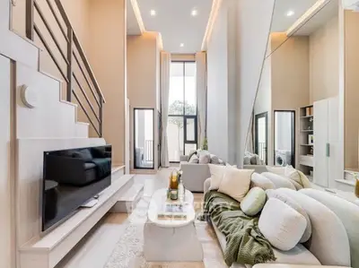 Luxurious modern living room with high ceilings and elegant decor