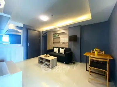 Modern living room with sleek furniture and ambient lighting