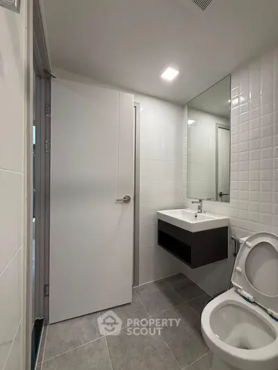 Modern bathroom with sleek fixtures and minimalist design