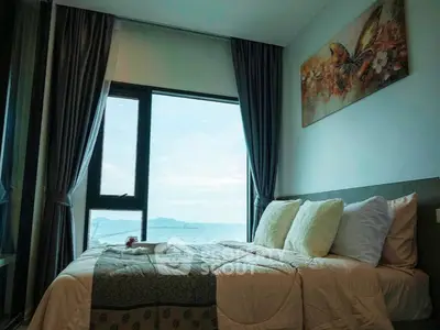 Cozy bedroom with stunning sea view and elegant decor