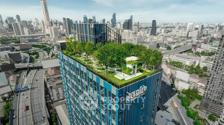 Stunning rooftop garden on a modern high-rise building with panoramic city views.
