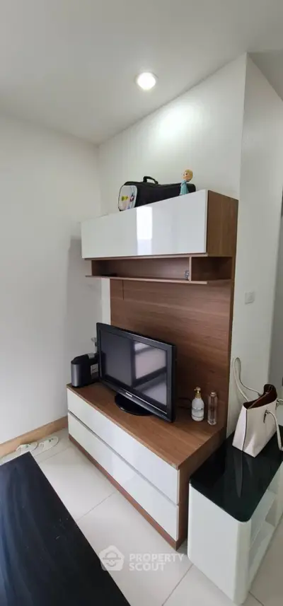 Modern living room with sleek TV unit and stylish decor
