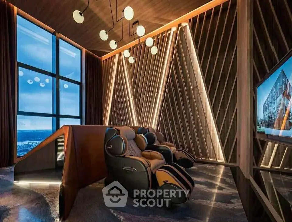 Luxurious home theater with ocean view and modern lighting design