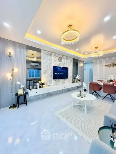Luxurious modern living room with elegant lighting and stylish decor, perfect for entertaining guests.