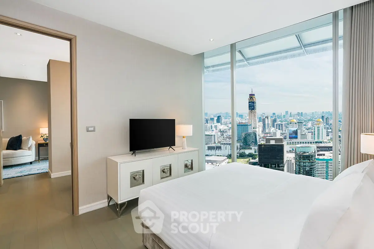 Luxurious bedroom with stunning city view and modern decor