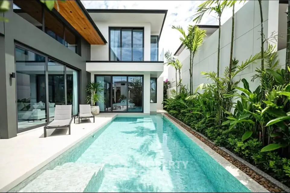 Luxurious modern villa with private pool and lush garden