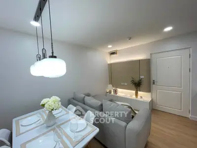 Modern living room with elegant dining area and cozy seating, perfect for stylish urban living.