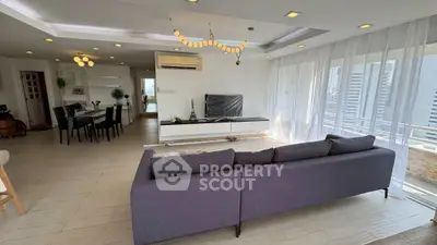 Spacious modern living room with elegant decor and natural light