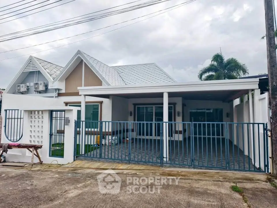 Charming modern house with spacious driveway and stylish facade in a serene neighborhood.