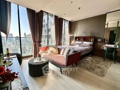 Luxurious bedroom with stunning city view and elegant decor