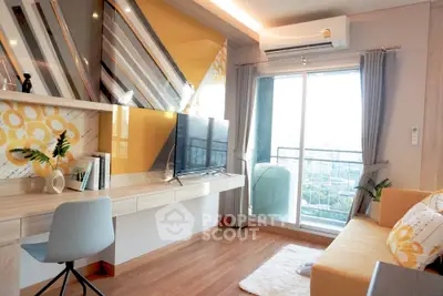 Modern living room with stylish decor and balcony view in a high-rise apartment