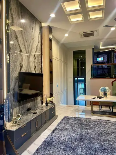 Luxurious modern living room with marble accents and elegant decor